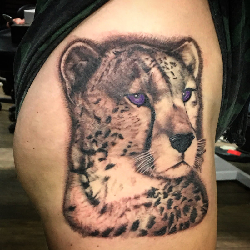 traditional cheetah tattoo